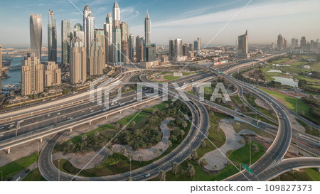 Dubai Marina highway intersection spaghetti junction night to day timelapse 109827373