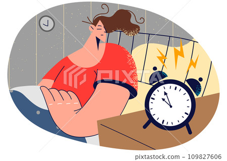 Sleepy woman awaken to alarm 109827606