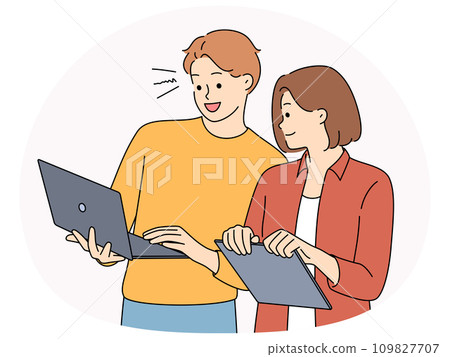Smiling colleagues cooperate on laptop 109827707