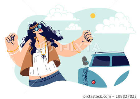 Hippie woman dances standing near minivan and celebrates start of trip or summer vacation 109827822