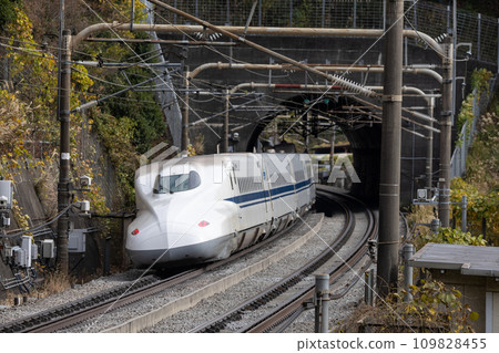 Tokaido Shinkansen emerging from the tunnel 109828455
