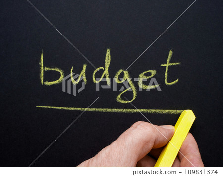 Handwritten chalk word budget. Financial planning. 109831374