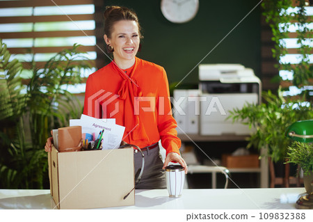 smiling 40 years old woman worker in green office smiling 40 years old woman worker in green office 109832388