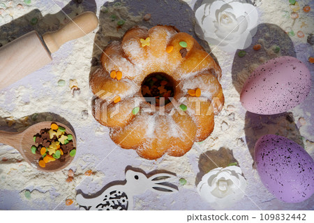 Easter cake with bunny and colored on white wooden table , Easter Holiday, Easter food 109832442