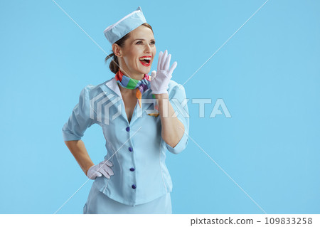 happy stylish stewardess woman on blue shouting happy stylish stewardess woman on blue shouting 109833258