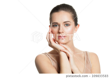 Isolated female model with healthy fresh wet skin and dark hair looking at camera\ 109833583