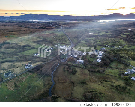 Smoke over Lough Fad due to traditionally burning of waste in rural Ireland - County Donegal 109834122