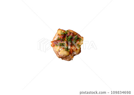 Meat baked in the oven with pineapple, tomatoes, cheese, spices and herbs Meat baked in the oven with pineapple, tomatoes, cheese, spices and herbs 109834698