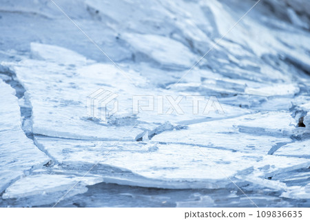 Broken ice shards lay on the coast of Baltic Sea Broken ice shards lay on the coast of Baltic Sea 109836635