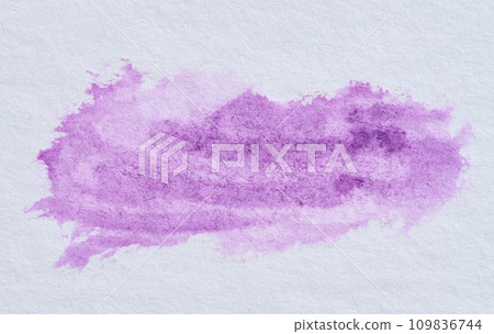 Watercolor brush stroke of violet paint on a white paper 109836744