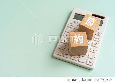 A block with the word save and a calculator 109839542
