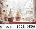 Cup cakes decorated with Christmas ornament close to the window and snow flake outside, generative AI. 109840599