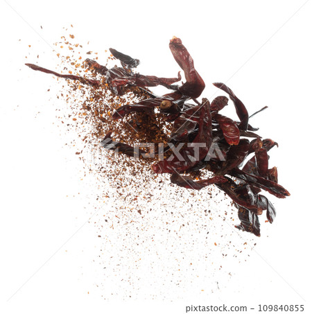 Dried Red hot Chilli fall down explosion, dried Red Chilli float explode, abstract cloud fly. Mix ground powder Chillis splash throwing in Air. White background Isolated high speed shutter, freeze Dried Red hot Chilli fall down explosion, dried Red Chilli float explode, abstract cloud fly. Mix ground powder Chillis splash throwing in Air. White background Isolated high speed shutter, freeze 109840855