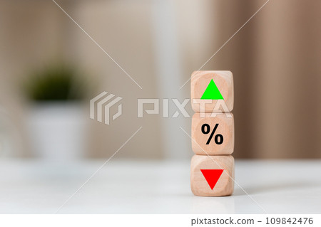 wooden cube block with percentage arrow high to low symbol icon. 109842476