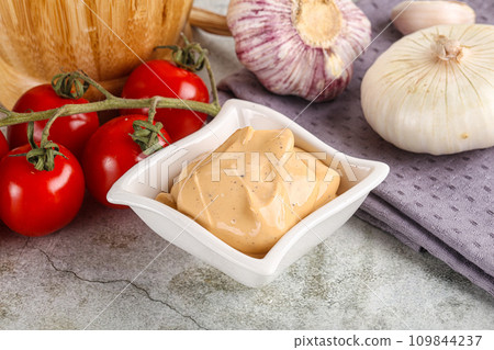 Yellow cream grill sauce for burger Yellow cream grill sauce for burger 109844237