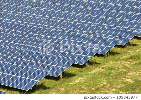 Aerial view of large sustainable electrical power plant with rows of solar photovoltaic panels for producing clean electric energy. Concept of renewable electricity with zero emission 109845977