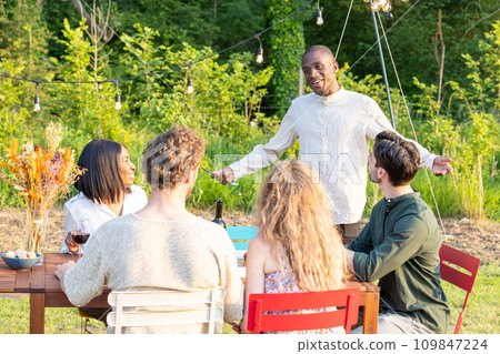 The Host's Welcome: A Gathering Under the Garden Lights 109847224