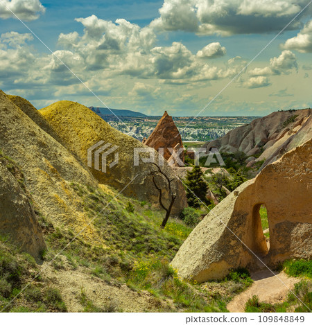 View of Goreme national park with over deep canyons, valleys sunset Cappadocia. 109848849