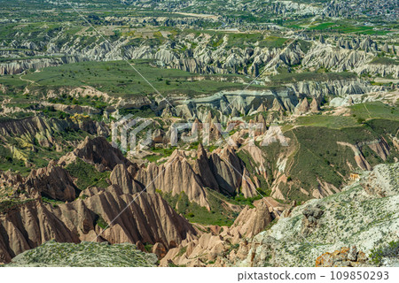 Panoramic view of Goreme national park with over deep canyons, valleys sunset Cappadocia. 109850293