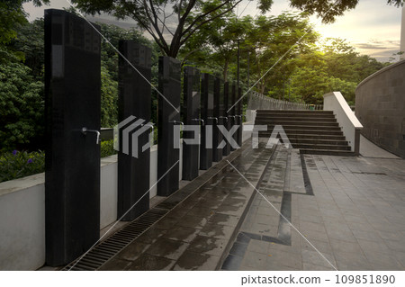 A row of water tap ablution places for Muslims 109851890