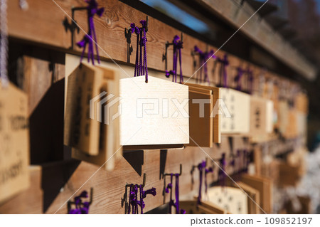 Japan wishing signs small wooden plate calls Ema in Japanese temples or shrines. 109852197