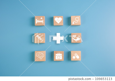 Medical health, patient and hospital concept.wooden blocks with stethoscope,heart and medical instrument icons. 109853113