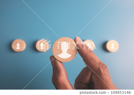 HR hiring recruit job.searching job and business leadership concept.hand holding wooden block with person icon. 109853146