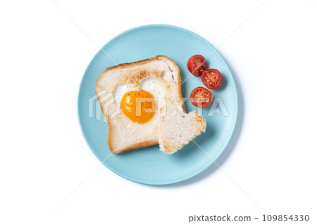 Valentine's Day breakfast with egg with tomatoes, heart shaped and toast bread isolated on white background 109854330