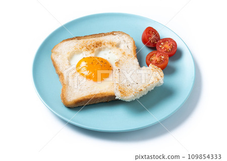 Valentine's Day breakfast with egg with tomatoes, heart shaped and toast bread isolated on white background 109854333