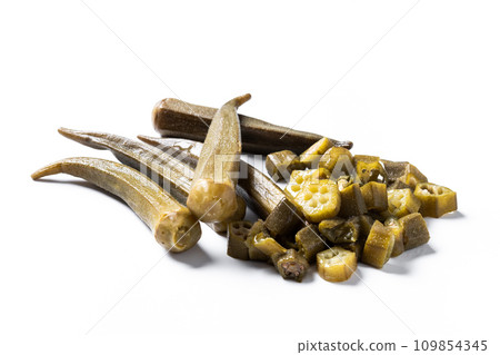 Okra slices isolated on white background. Close up Okra slices isolated on white background. Close up 109854345