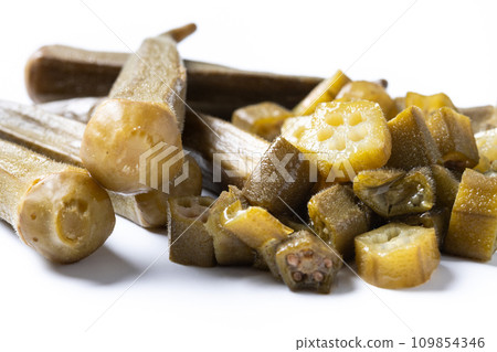 Okra slices isolated on white background. Close up Okra slices isolated on white background. Close up 109854346