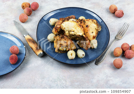 Roasted chicken pieces with lychee. Roasted chicken pieces with lychee. 109854907