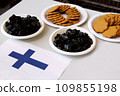 Finnish specialty food salmiakki and cinnamon cookies 109855198