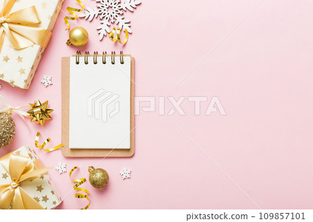 Christmas blank greeting card mock-up scene. Creative layout made of Christmas tree branches and paper card note. Flat lay. Nature New Year concept 109857101
