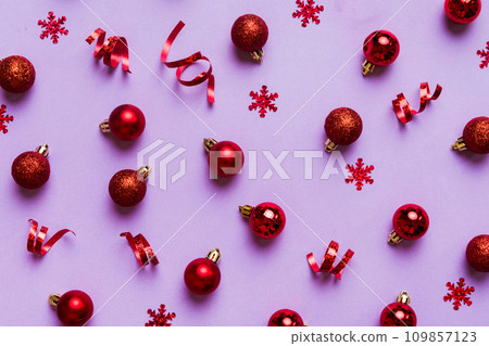 Christmas composition. a pattern of christmas balls on colored background. Flat lay, top view New year decor Christmas composition. a pattern of christmas balls on colored background. Flat lay, top view New year decor 109857123