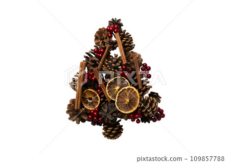 Isolated Christmas tree made from natural cones on colored background, view from above. New Year minimal concept with copy space 109857788