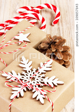 Christmas gift boxes on wooden table. Top view with copy space Christmas gift boxes on wooden table. Top view with copy space 109857843