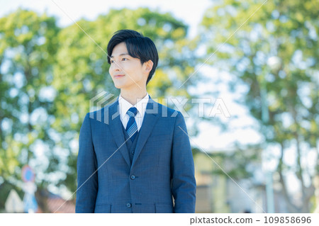 young man wearing a suit 109858696