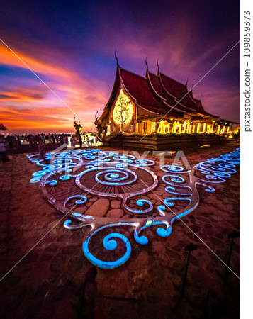 Wat Sirindhorn Wararam glowing temple in Ubon, Thailand 109859373