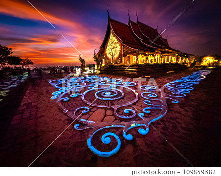 Wat Sirindhorn Wararam glowing temple in Ubon, Thailand 109859382