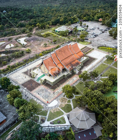 Aerial view of Wat Sirindhorn Wararam glowing temple in Ubon, Thailand Aerial view of Wat Sirindhorn Wararam glowing temple in Ubon, Thailand 109859404
