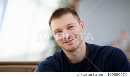 Handsome and Smiling Male Face Closeup Portrait 109860074