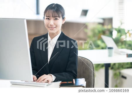Young career woman listening to customer feedback 109860169