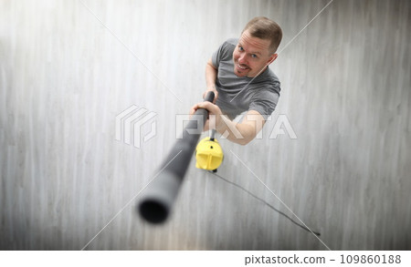 Happy adult and electrical machine 109860188