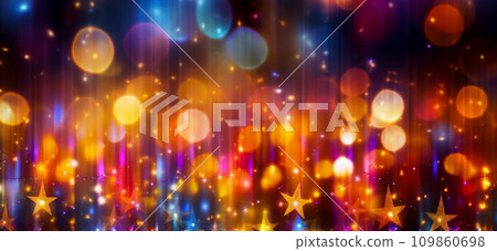 Falling multi-colored stars, blurred background with bright colors of shiny and glowing stripes of light garlands and lights idea for a New Year card or Christmas banner Falling multi-colored stars, blurred background with bright colors of shiny and glowing stripes of light garlands and lights idea for a New Year card or Christmas banner 109860698