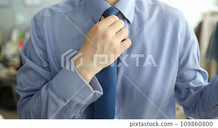 Headless male posing on camera Headless male posing on camera 109860800