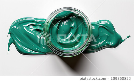 Emerald paint swatch in a jar on a white surface background, idea for product advertising and banner concept 109860833
