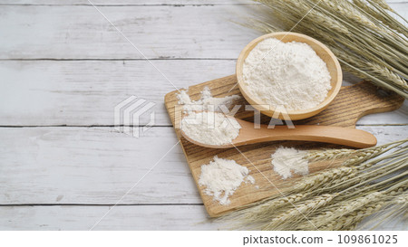 flour and wheat ears flour and wheat ears 109861025