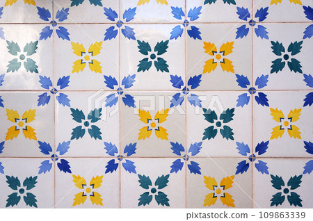 Traditional Azulejo Tiles on a Wall of Buildings in Lisbon, Portugal. 109863339