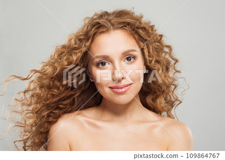 Charming redhead model woman with long healthy wavy hairstyle, perfect clean fresh skin 109864767